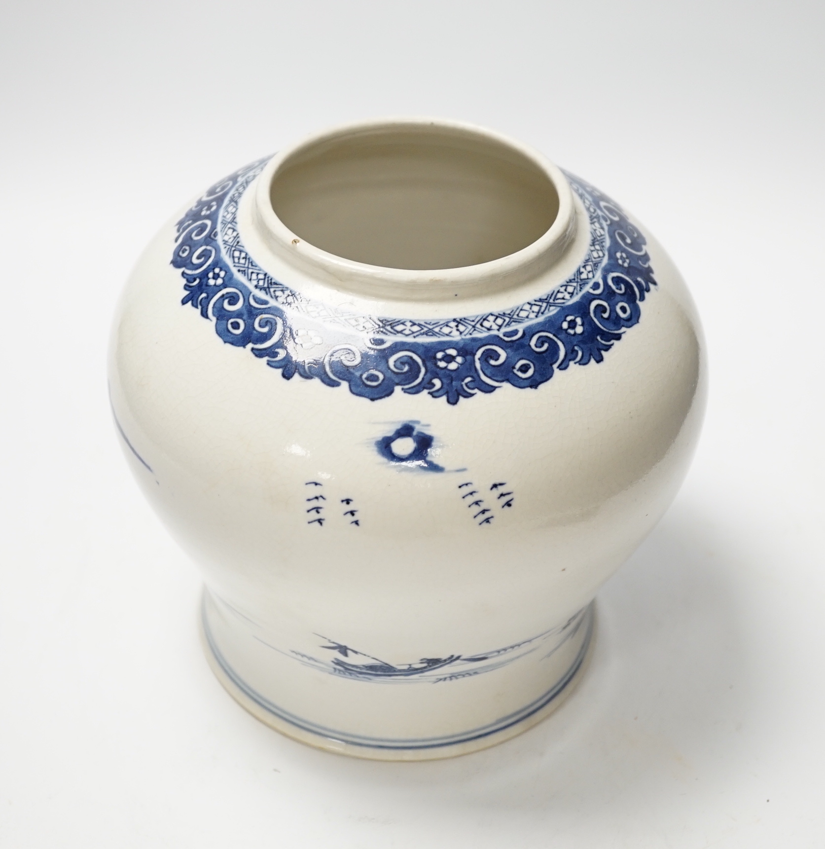 A Chinese Qianlong blue and white ‘soft paste’ porcelain landscape jar, 19cm high